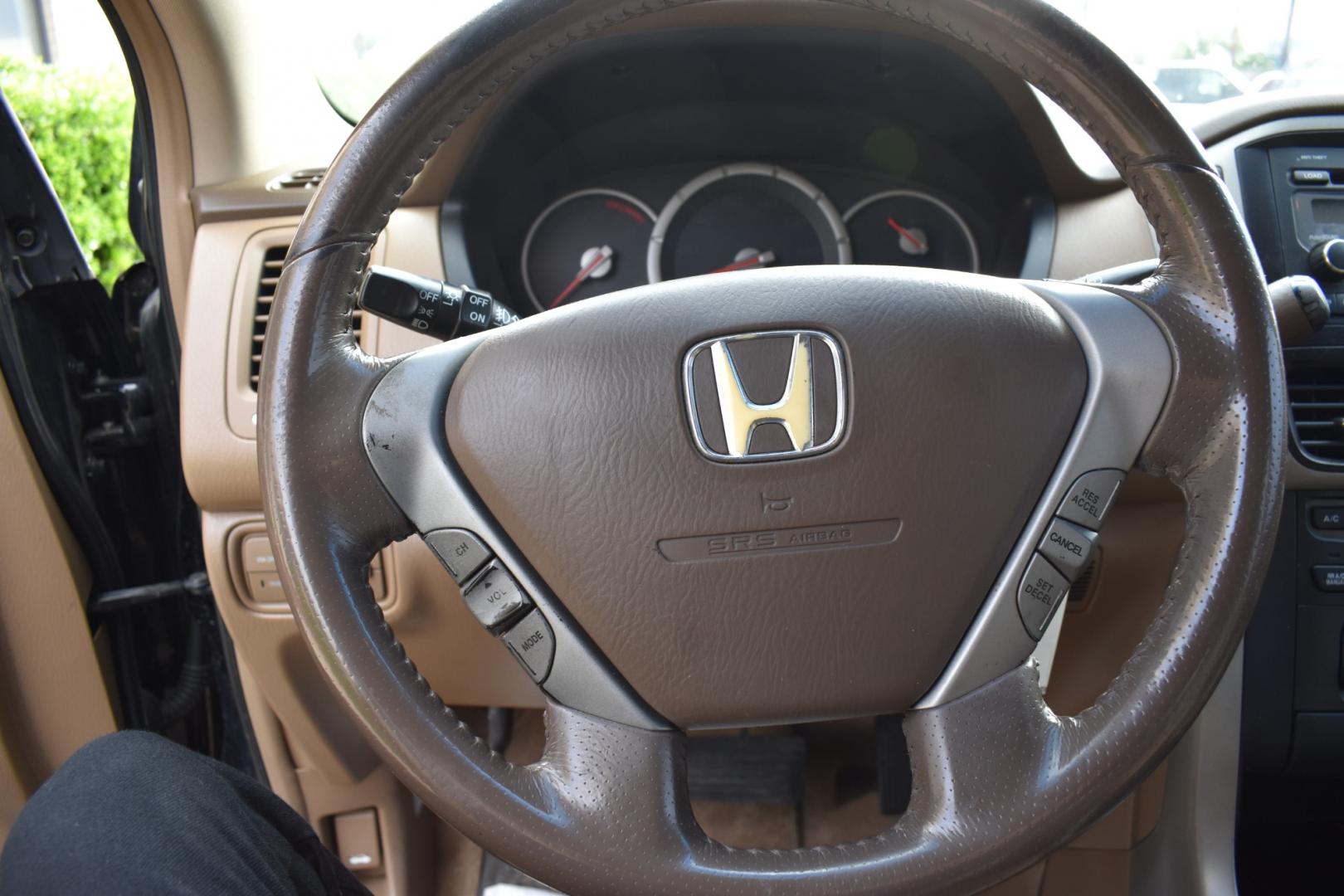 2006 Black /Brown Honda Pilot EX w/ Leather (5FNYF28556B) with an 3.5L V6 SOHC 24V engine, 5-Speed Automatic Overdrive transmission, located at 5925 E. BELKNAP ST., HALTOM CITY, TX, 76117, (817) 834-4222, 32.803799, -97.259003 - Buying a 2006 Honda Pilot EX can offer several benefits, building upon the strengths of its predecessors while incorporating some improvements. Here are some potential advantages: Reliability: Honda has a strong reputation for building reliable vehicles, and the 2006 Pilot is no exception. By 2006, - Photo#9